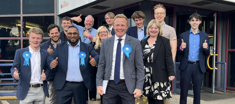 Robbie Moore MP and his supporters celebrating after the 2024 general election